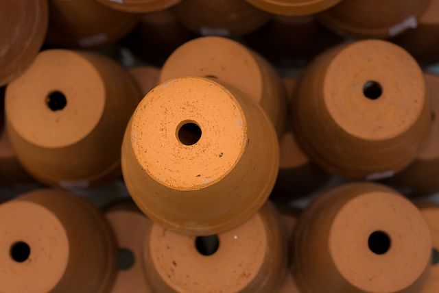 Plant pot with a drainage hole